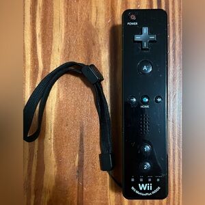 Nintendo Wii Remote Controller with MotionPlus, Wrist Strap included-Black
